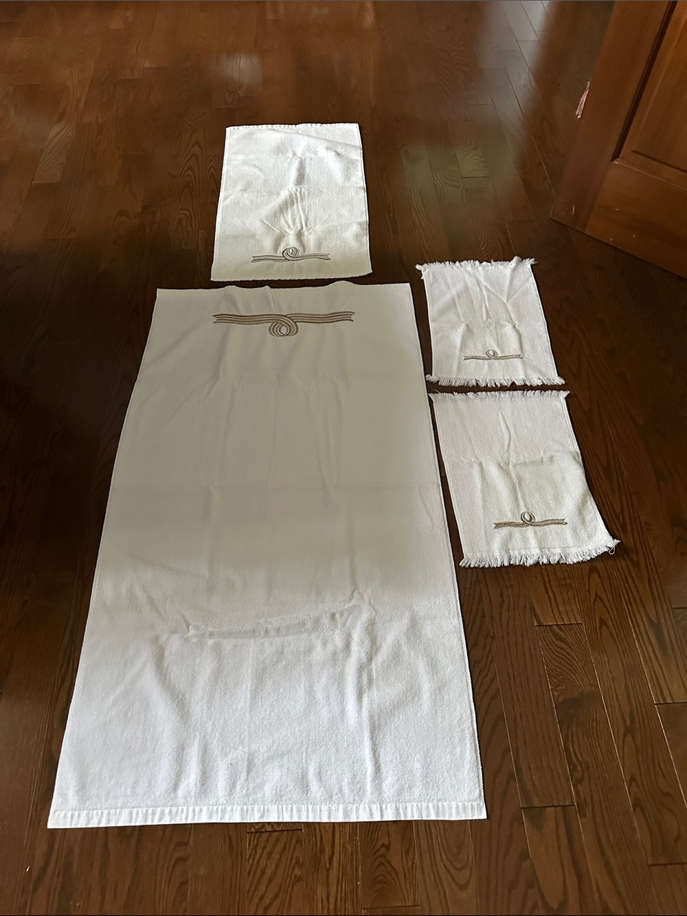 White Towel Set with Beige/Gold  Embroidered Knot Detail
